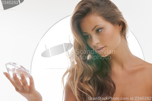 Image of beautiful woman with diamond