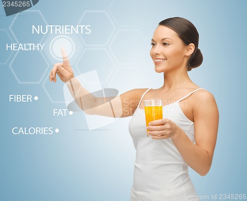 Image of woman with glass of juice and virtual screen