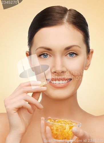 Image of woman with vitamins