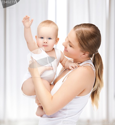 Image of happy mother with adorable baby