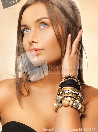 Image of beautiful woman with bracelets