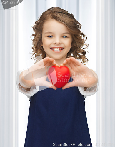 Image of girl with small heart