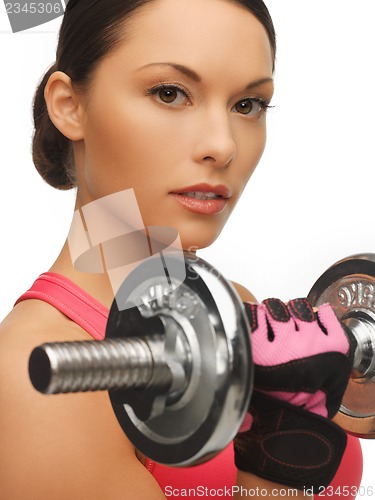 Image of woman with dumbbells