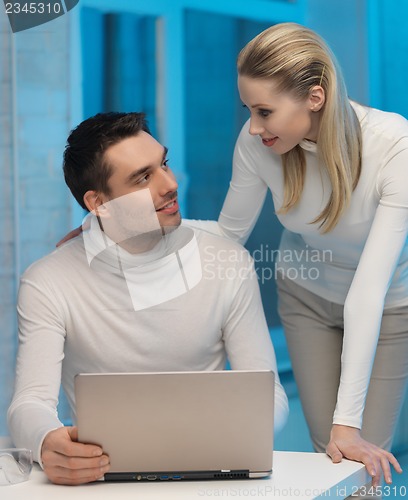 Image of man and woman in laboratory