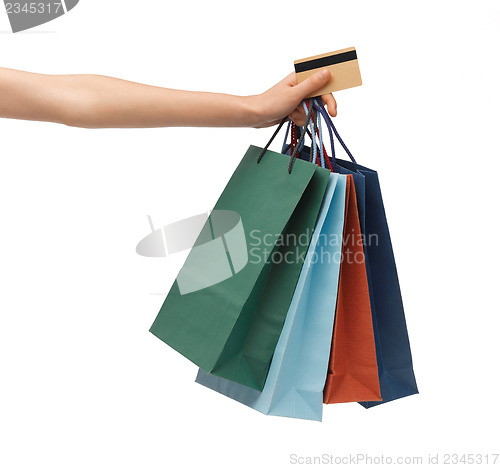 Image of multi colored shopping bags and credit card