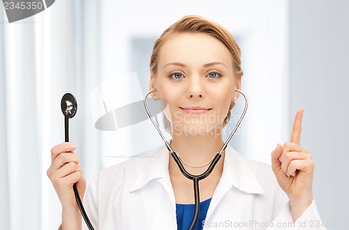 Image of attractive female doctor with stethoscope