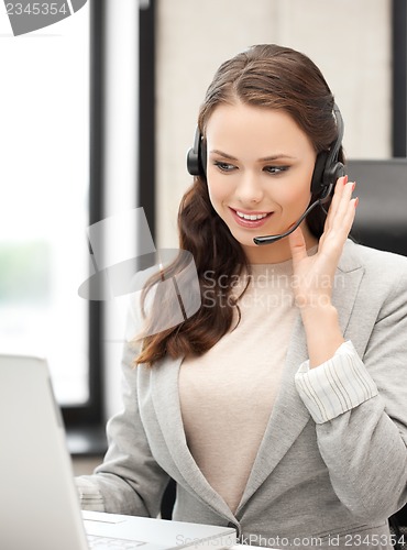 Image of friendly female helpline operator