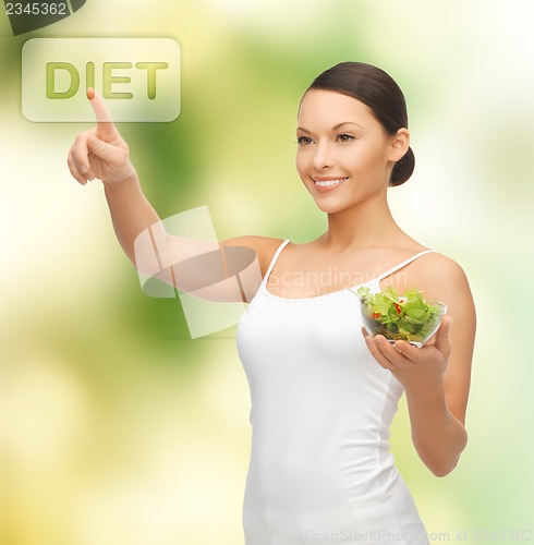 Image of healthy woman holding bowl with salad