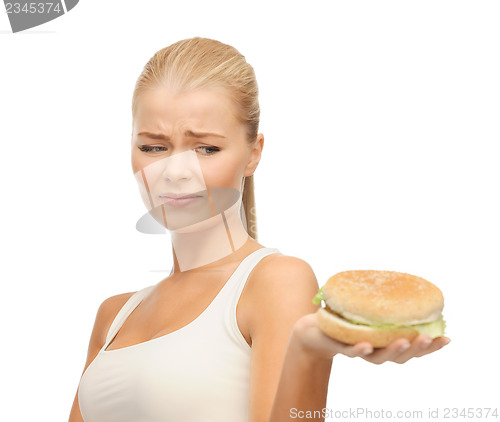 Image of woman rejecting junk food