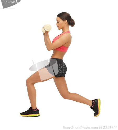 Image of woman with dumbbells