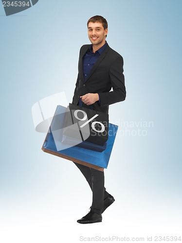 Image of man with shopping bags