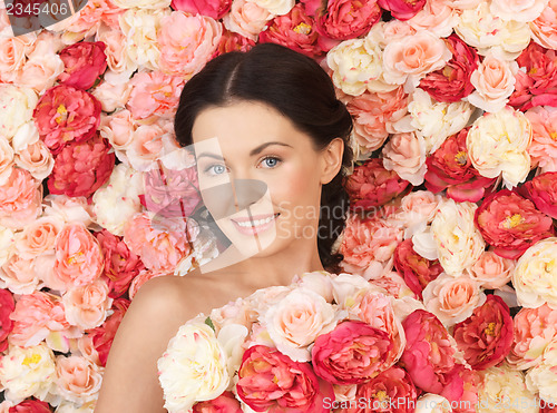 Image of woman with background full of roses