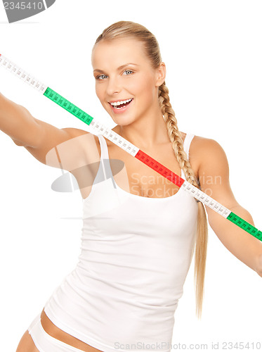 Image of young beautiful woman with measure tape