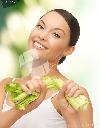 Image of woman with fresh celery