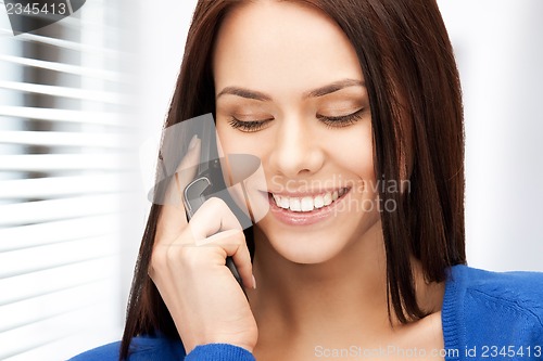 Image of businesswoman with cell phone