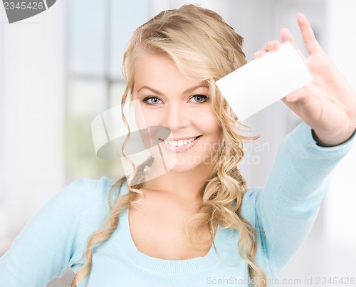 Image of happy girl with business card