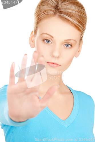 Image of woman making stop gesture