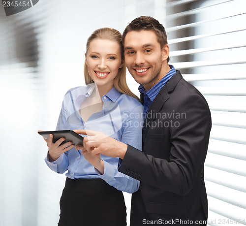 Image of man and woman with tablet pc