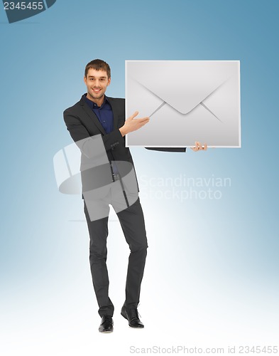 Image of man showing virtual envelope