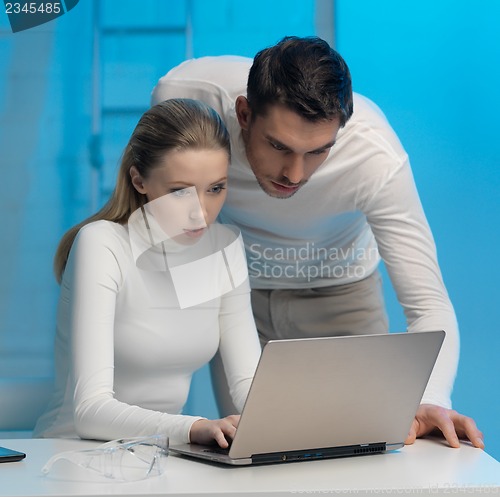 Image of man and woman in laboratory