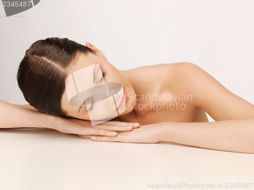 Image of beautiful woman with closed eyes