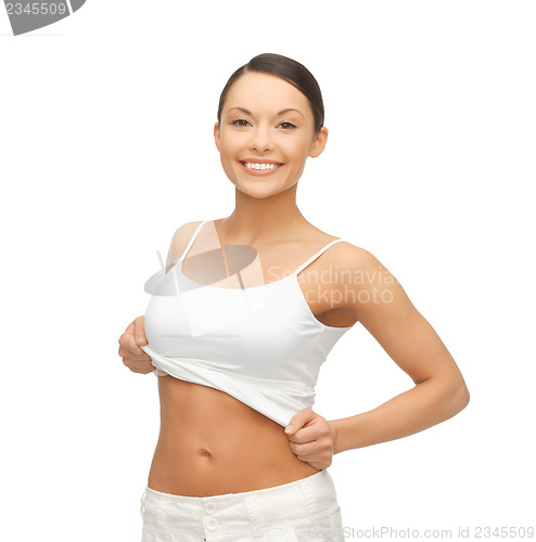 Image of woman taking off  blank white t-shirt