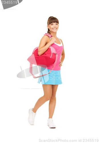 Image of sporty woman with sports bag