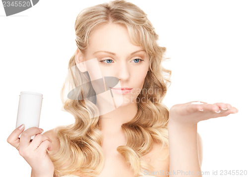 Image of woman with pills