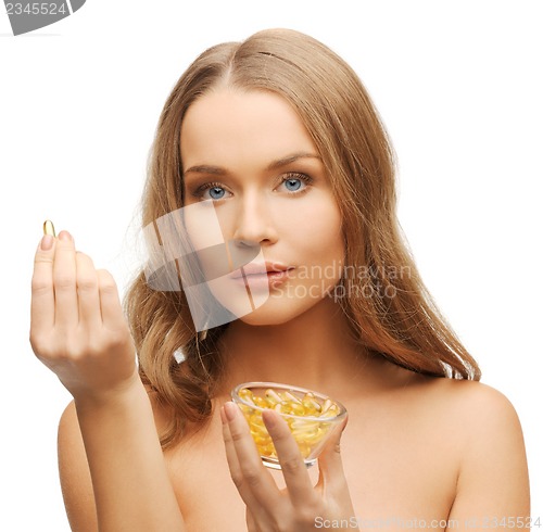 Image of woman with vitamins