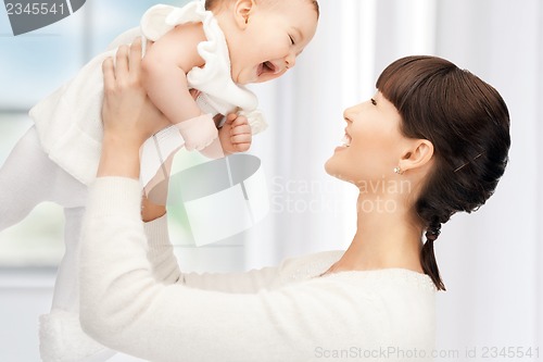 Image of happy mother with adorable baby