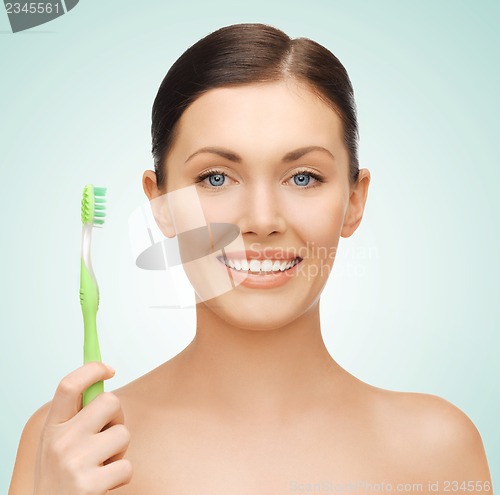 Image of woman with toothbrush