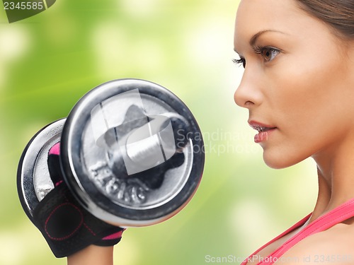 Image of woman with dumbbells