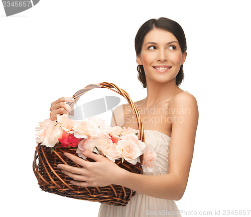 Image of woman with basket full of flowers