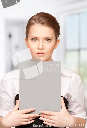 Image of woman with blank board