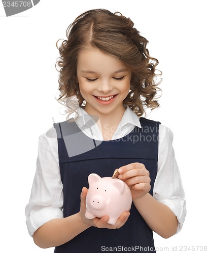 Image of girl with piggy bank