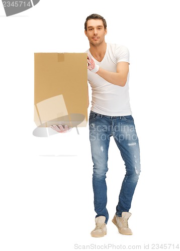 Image of handsome man with big box