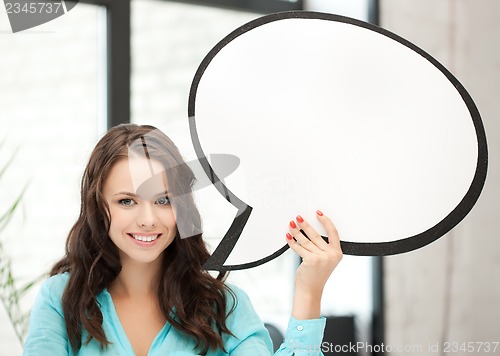 Image of smiling young woman with blank text bubble