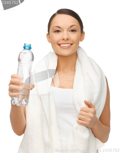 Image of woman with towel and bottle of water