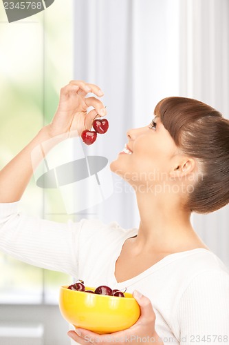 Image of woman with cherries