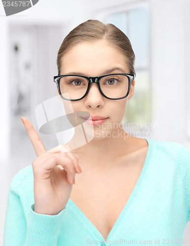 Image of woman with her finger up