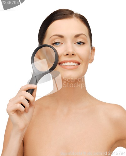 Image of woman with magnifying glass