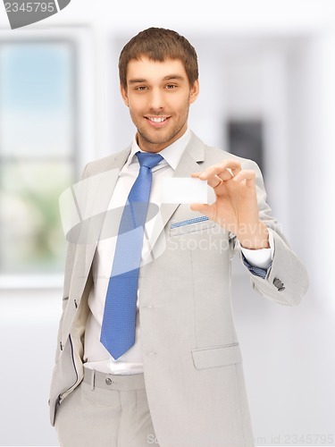 Image of businessman with business card