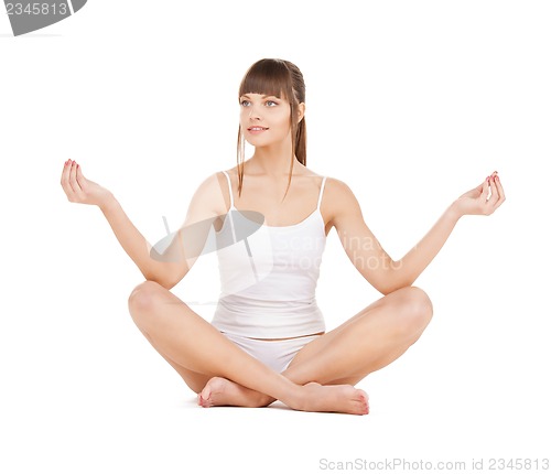 Image of woman practicing yoga