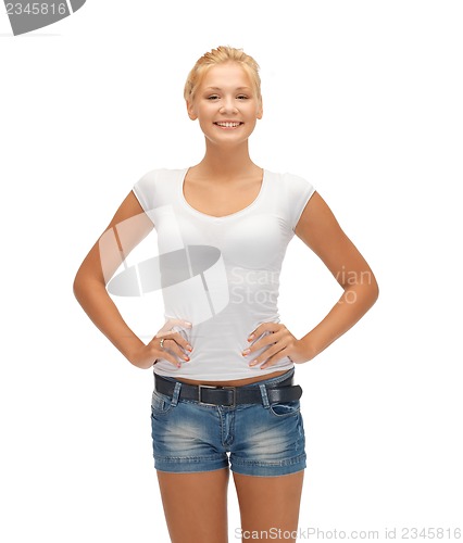 Image of smiling teenage girl in blank white t-shirt