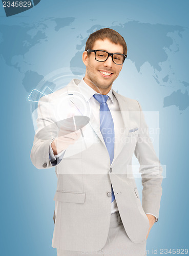 Image of businessman pressing virtual button