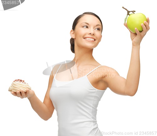 Image of woman with cake and apple