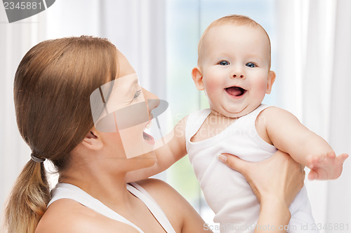 Image of happy mother with adorable baby