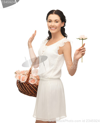 Image of woman with basket full of flowers