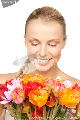 Image of woman with red flowers