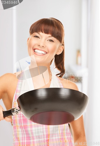 Image of housewife with frying pan